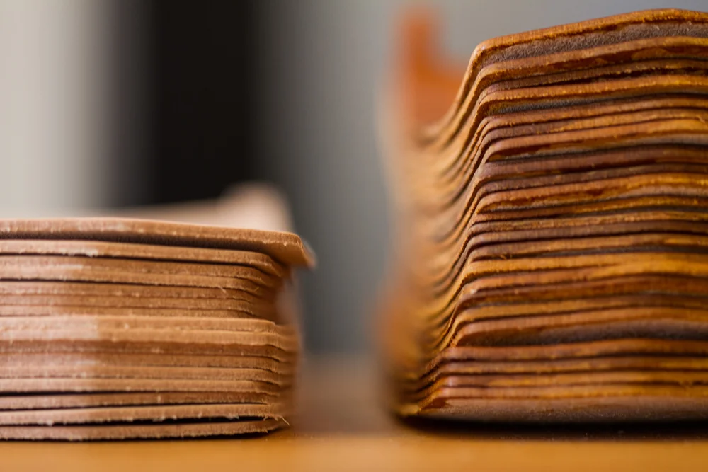 Cut leather blanks on the bench